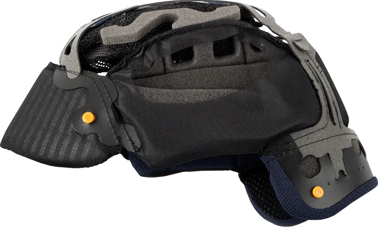 Black motorcycle helmet interior with gray foam padding, mesh lining, and orange adjustment buttons for comfort and fit.