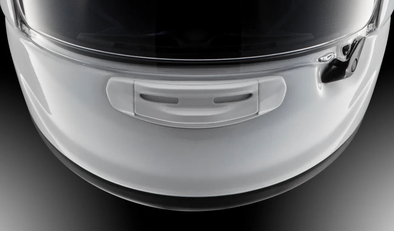 White motorcycle helmet with clear visor and chin vent for airflow and safety