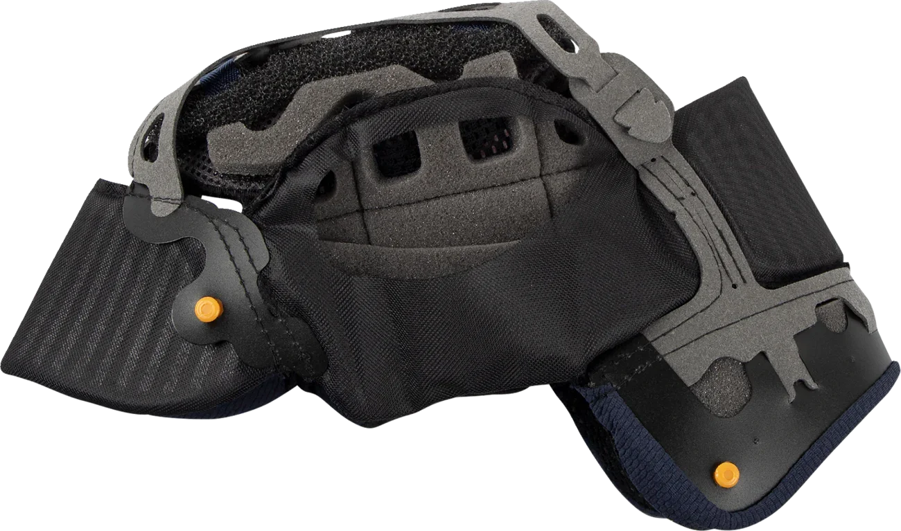 Motorcycle helmet interior with black padding, gray shell, and orange adjustment knobs for comfort and fit