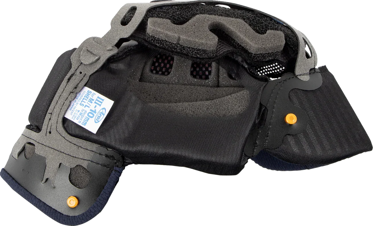 Black motorcycle helmet interior with gray foam padding, ventilation holes, and orange adjustment knobs