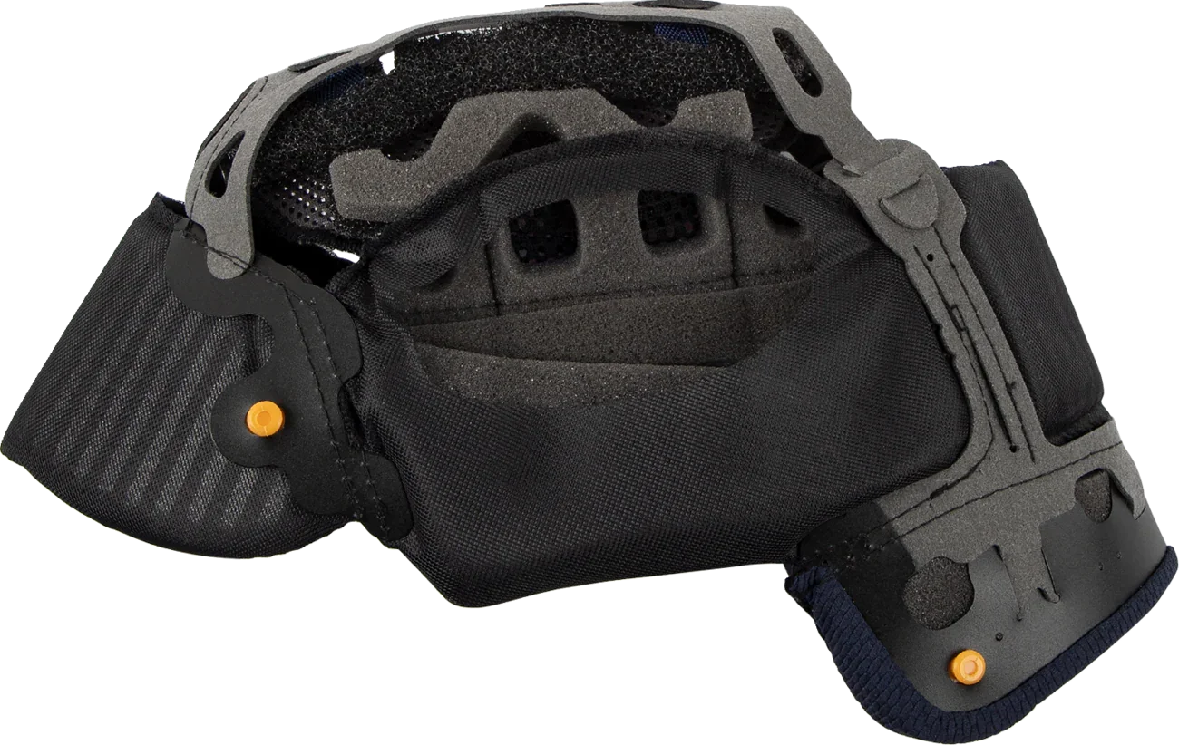 Black motorcycle helmet interior with padded lining and orange adjustment knobs for secure fit