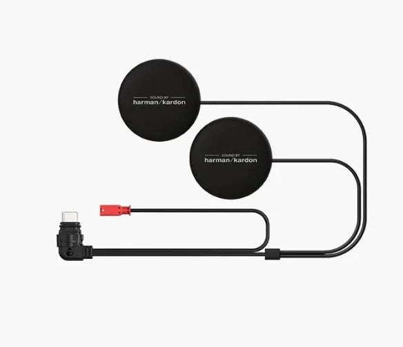 Harman Kardon audio system components on a white background
