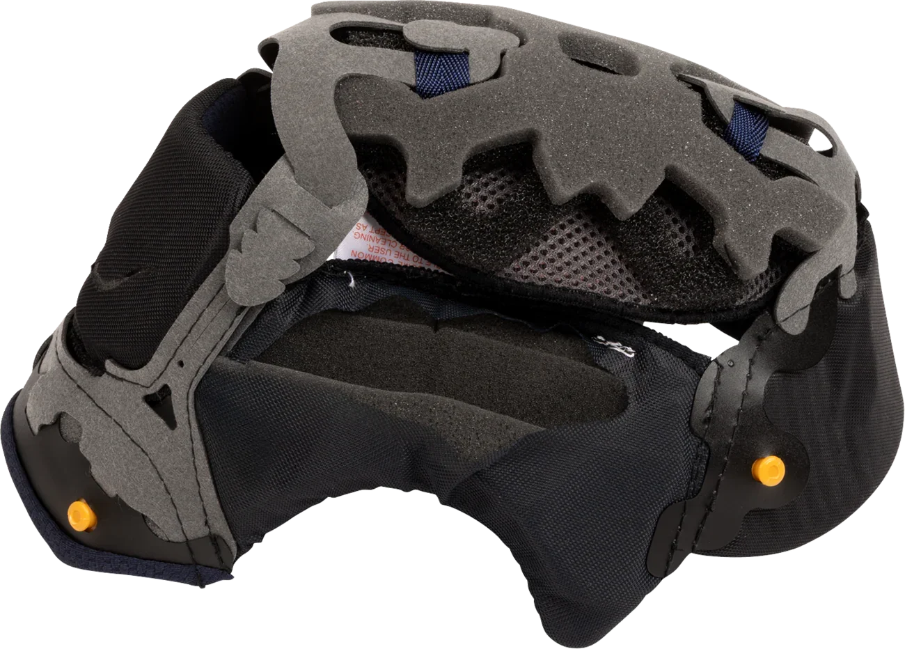 Motorcycle helmet interior with gray foam padding, black mesh lining, and orange adjustment knobs for comfort and fit