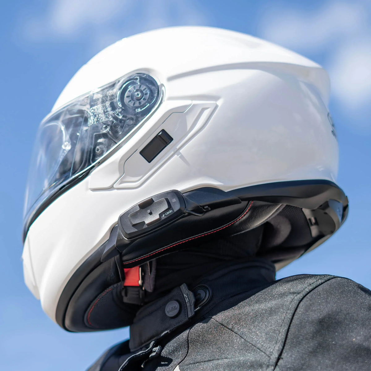 Cardo Packtalk-S installed in a SHOEI helmet