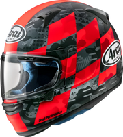 Arai Drudi Performance motorcycle helmet with red and black geometric design, clear visor, and blue interior lining.