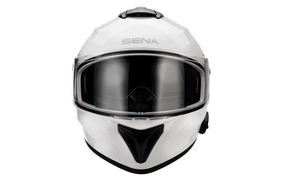 White Sena motorcycle helmet with a reflective visor on a white background