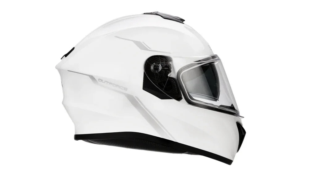White motorcycle helmet with clear visor on a white background