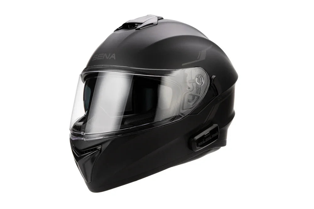 Black motorcycle helmet with clear visor on a white background