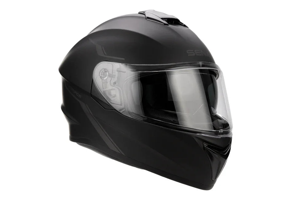 Black motorcycle helmet with clear visor on a white background